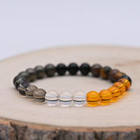 Bracelet Alchimie Opportunités et Réussite en pierres naturelles de 8 mm, composé de Citrine jaune, Pyrite grise métallique, Obsidienne noire, Cristal de Roche transparent, Quartz Fumé brun et Œil de Tigre.